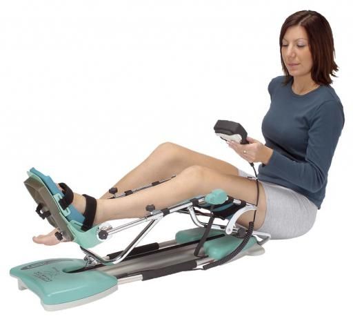KINETEC SPECTRA ESSENTIAL KNEE CPM / INCLUDING DELUXE HYGIENIC PADS photo