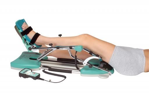 KINETEC SPECTRA ESSENTIAL KNEE CPM / INCLUDING DELUXE HYGIENIC PADS photo