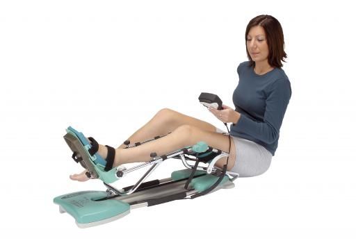 KINETEC SPECTRA ESSENTIAL KNEE CPM / INCLUDING DELUXE HYGIENIC PADS photo
